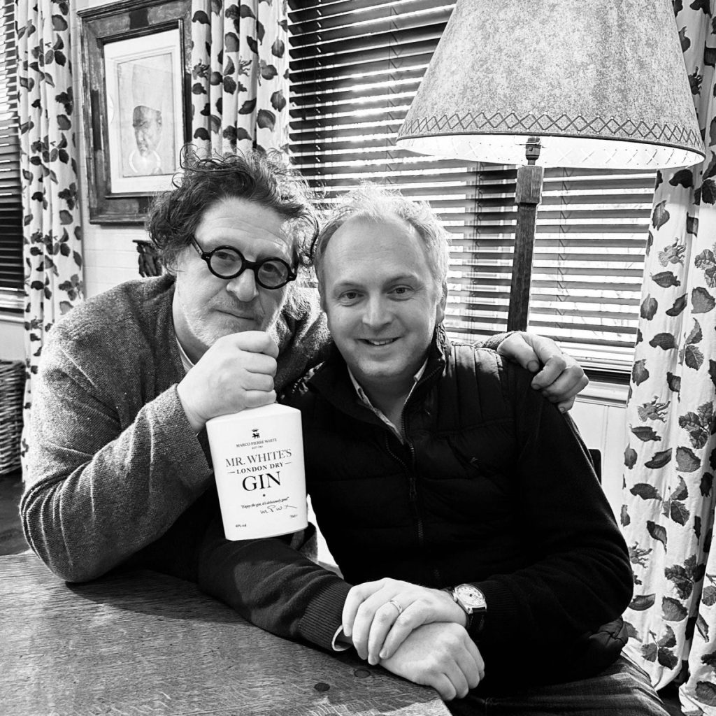 Marco Pierre White & Chris Sadler pose with a bottle of Mr White's London Dry Gin